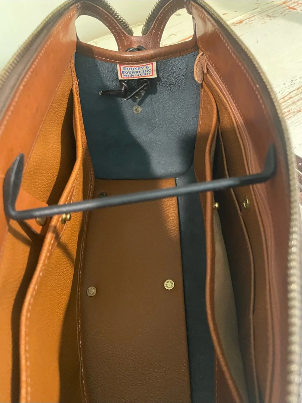 Dooney & Bourke vintage AWL Black and Brown Pebbled Leather Satchel / crossbody
